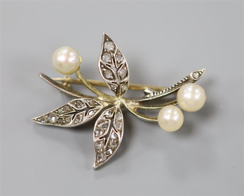 An early 20th century yellow and white metal, cultured pearl and rose cut diamond set floral spray brooch, 29mm, gross 4.2 grams.